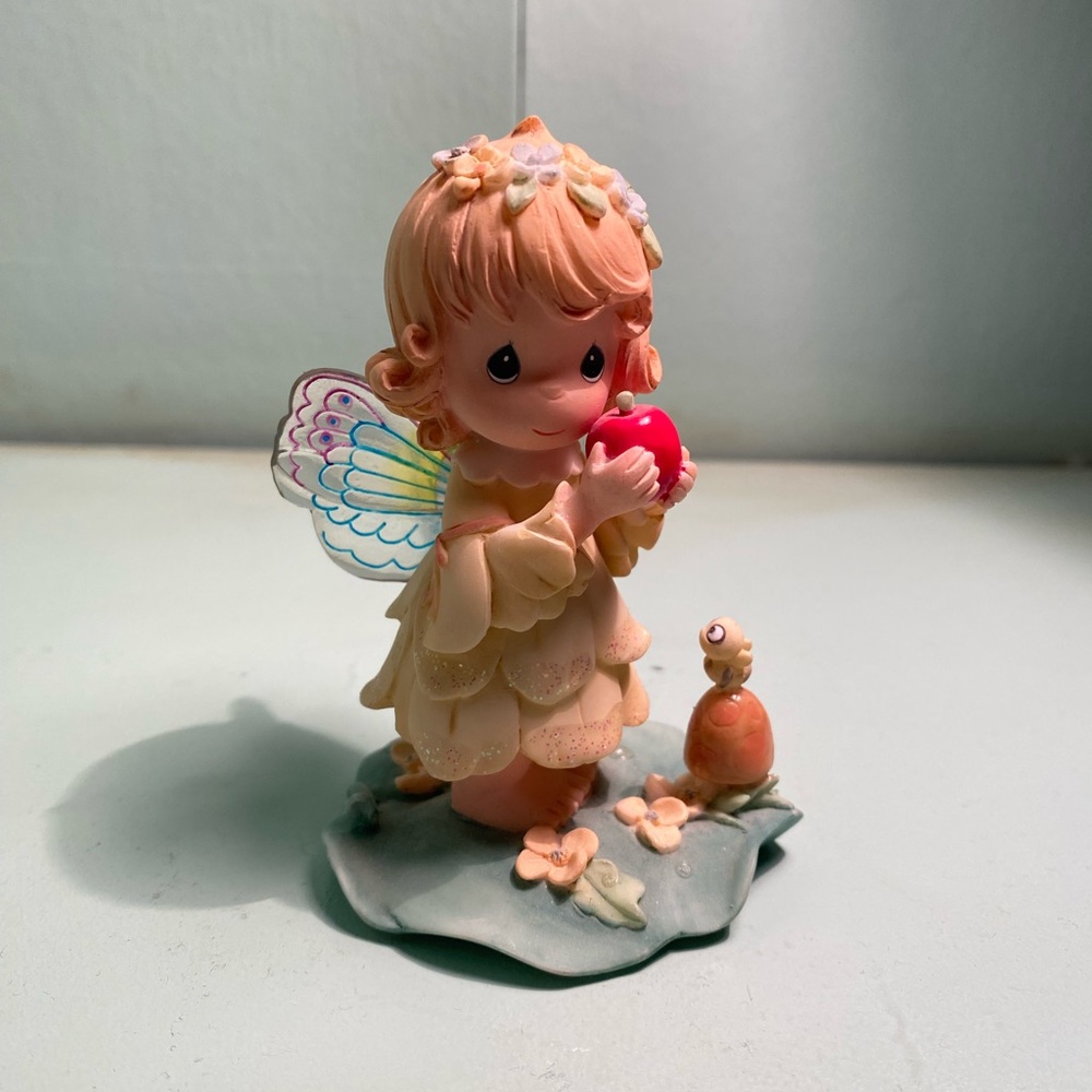 Precious Moments 2001 fairy with apple